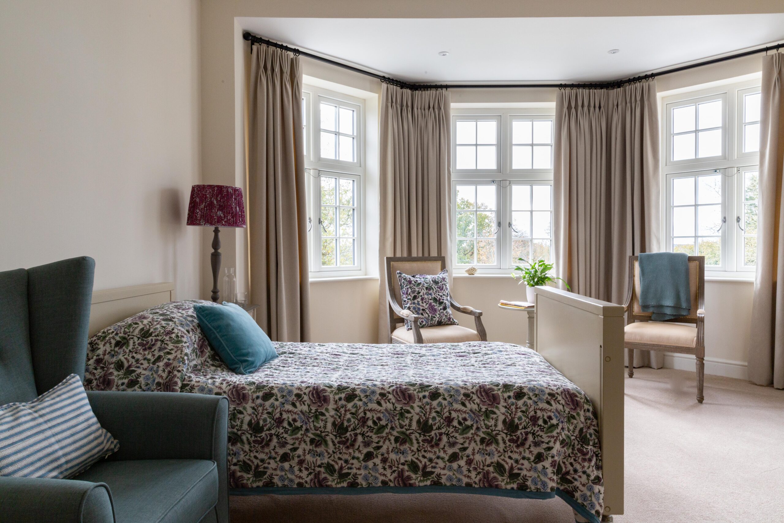 Resident bedroom at Elliscombe House with modern furnishings and a homely design